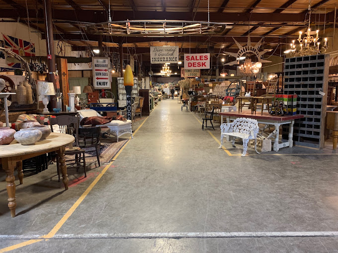 Inside the warehouse lined with antique furniture and other finds