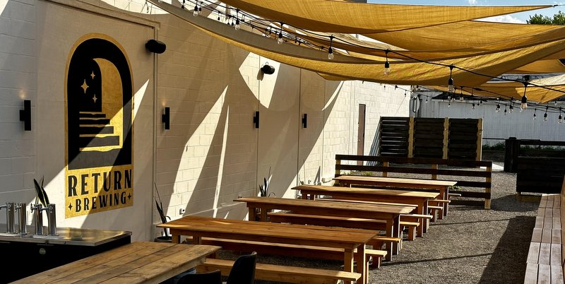 Outdoor seating area with picnic tables