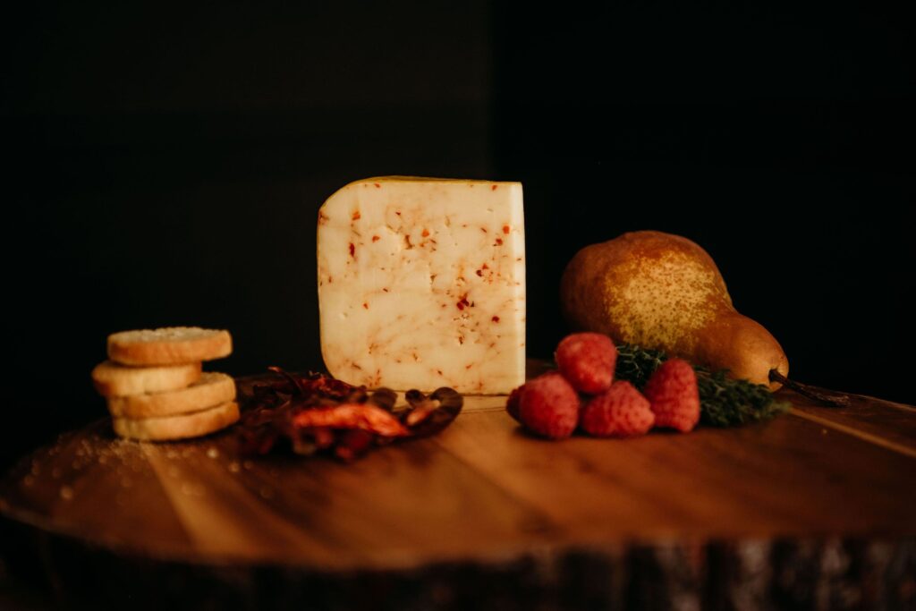 Cheese board with some bread and fruit